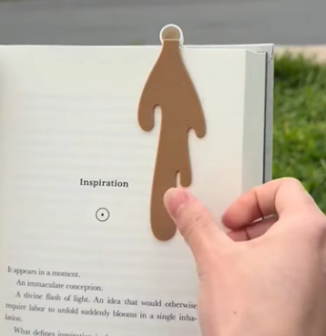 Creative Coffee Bookmark in use, featuring a charming design that adds style and keeps your place in a book.
