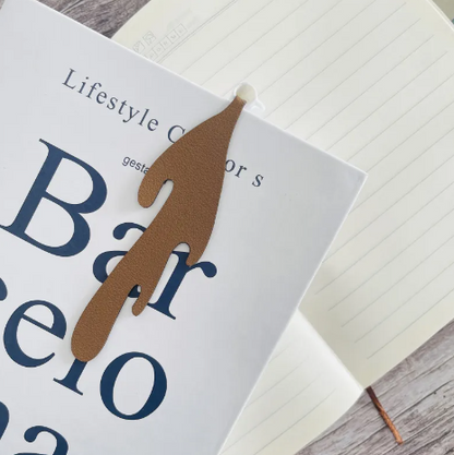 Creative Coffee Bookmark featuring a stylish design placed on an open notebook and book.